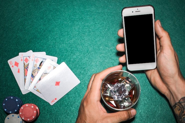 Pengguna km354 memantau pengaturan waktu dan anggaran taruhan secara mobile